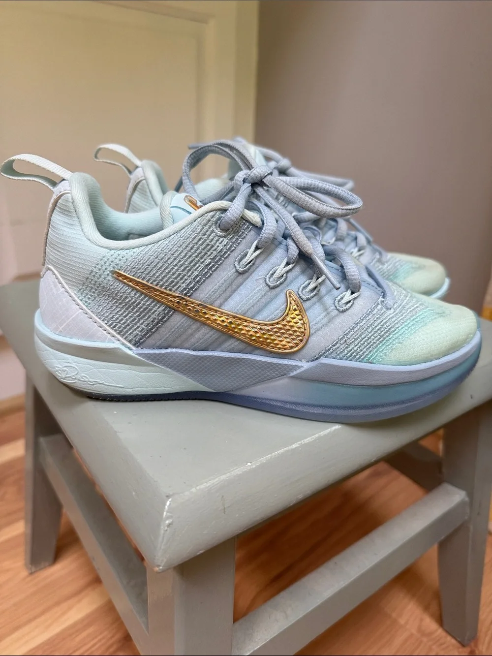 Nike Kids Light Blue Sneakers with Gold Swoosh